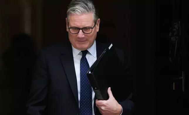 Britain's Prime Minister Keir Starmer leaves 10 Downing Street in London, Monday, April 20, 2026 to face a showdown in Parliament over the appointment of Peter Mandelson as ambassador to Washington.(AP Photo/Alastair Grant)