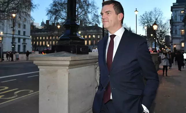 FILE - Olly Robbins walks on Whitehall in Westminster, London, Jan. 17, 2019. (Dominic Lipinski/PA via AP, File)