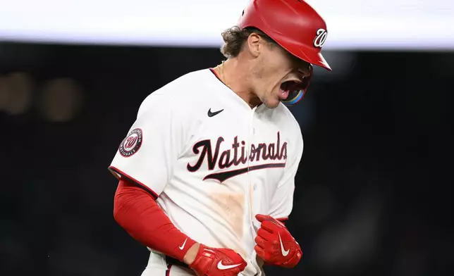 Washington Nationals' Brady House reacts after he ht a two-run home run during the eighth inning of a baseball game against the St. Louis Cardinals, Monday, April 6, 2026, in Washington. (AP Photo/Nick Wass)