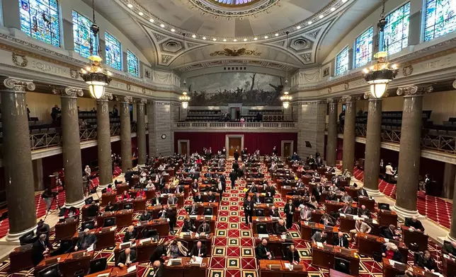 Lawmakers work in the Missouri House chamber Tuesday, April 21, 2026, in Jefferson City, Mo. (AP Photo/David A. Lieb)