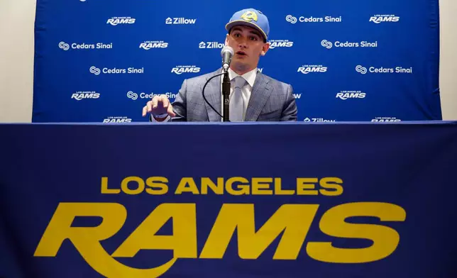 Los Angeles Rams first-round draft pick Ty Simpson answers questions during an NFL football news conference Friday, April 24, 2026, in Inglewood, Calif. (AP Photo/Caroline Brehman)