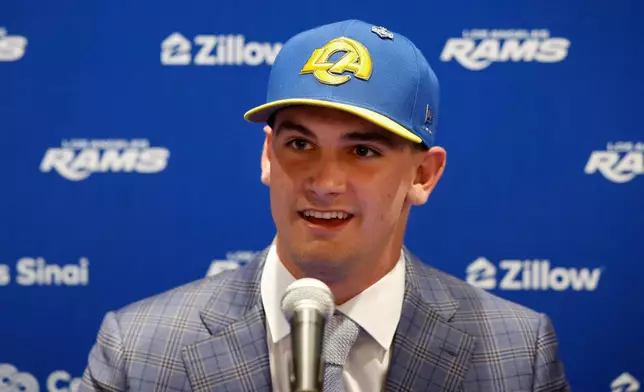 Los Angeles Rams first-round draft pick Ty Simpson answers questions during an NFL football news conference Friday, April 24, 2026, in Inglewood, Calif. (AP Photo/Caroline Brehman)