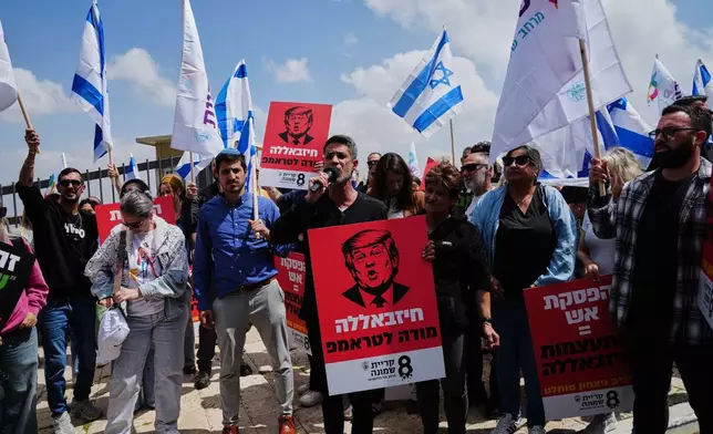 Residents of northern Israel living near the Lebanese border protest the security situation, outside the U.S. Embassy in Jerusalem Sunday, April 19, 2026. Hebrew on a sign bearing an image of President Trump reads "Hezbollah thanks Trump." (AP Photo/Mahmoud Illean)