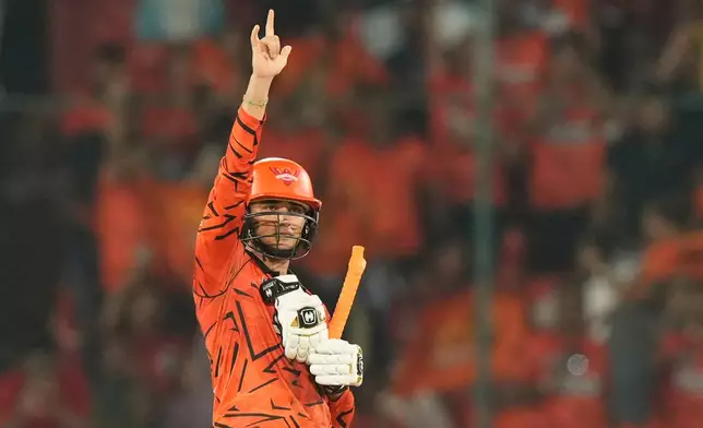 Sunrisers Hyderabad's Abhishek Sharma celebrates his century during the Indian Premier League cricket match between Sunrisers Hyderabad and Delhi Capitals in Hyderabad, India, Tuesday, April 21, 2026. (AP Photo/Mahesh Kumar A.)