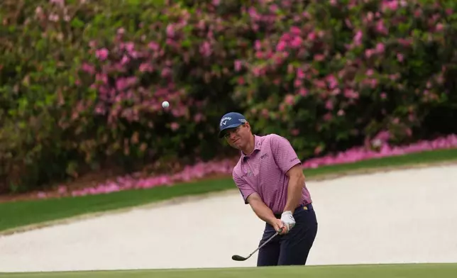 Max Greyserman hits from the bunker on the 13th hole during a practice round ahead of the Masters golf tournament at the Augusta National Golf Club, Monday, April 6, 2026, in Augusta, Ga. (AP Photo/Matt Slocum)