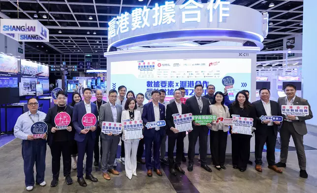 The Hong Kong/Shanghai Co-operation Open Data Challenge 2026 set up the Hong Kong/Shanghai Data Co-operation Pavilion at the InnoEX held from April 13 to 16. Photo shows the Acting Commissioner for Digital Policy, Mr Daniel Cheung (front row, fifth right), the Acting Deputy Commissioner (Digital Infrastructure), Ms Cari Wu (front row, fourth right), and other guests visiting the Pavilion on April 13. Source: HKSAR Government Press Releases