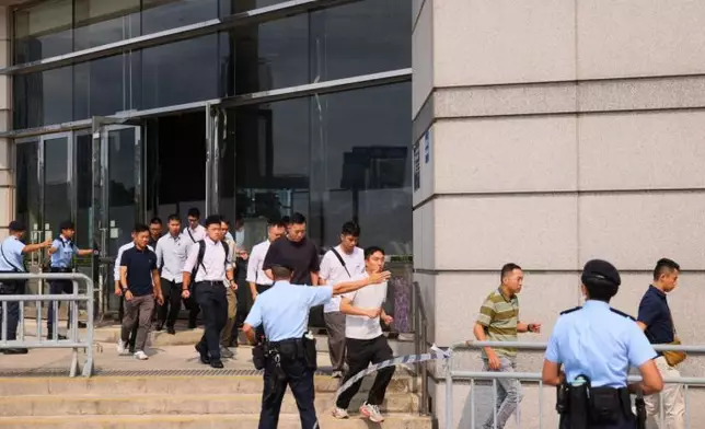 The Hong Kong Police Force (HKPF) today (April 16), in collaboration with the INTERPOL and police forces from other jurisdictions, cybersecurity agency and operators of critical infrastructures, conduct the Counter Cyber and Physical Terrorism Joint Exercise 2026, codenamed “STEALTHNET”. Photo shows police officers assisting with evacuation at the scene. Source: HKSAR Government Press Releases