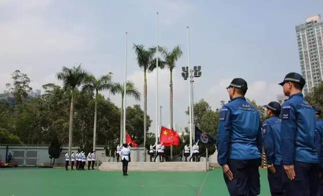 The Civil Aid Service (CAS) held the Passing-out Parade for the 92nd Recruits and 14th Tactical Force Secondment Scheme at its headquarters today (April 19). Photo shows the CAS Guard of Honour conducting a flag-raising ceremony. Source: HKSAR Government Press Releases