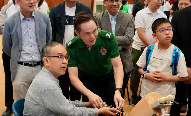 AMS open day promotes National Security Education Day  Source: HKSAR Government Press Releases