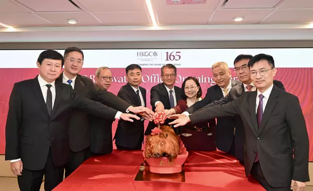 The Financial Secretary, Mr Paul Chan, attended the Hong Kong General Chamber of Commerce (HKGCC) Renovated Office Opening Ceremony today (April 22). Photo shows Mr Chan (centre); the Chairman of HKGCC, Ms Agnes Chan (fourth right); the Deputy Chairman of HKGCC, Dr Peter Lam (third left); the Director General of the Coordination Department of the Liaison Office of the Central People's Government (LOCPG) in the Hong Kong Special Administrative Region (HKSAR), Mr Zhu Wen (fourth right); the Deputy Director-General of the Economic Affairs Department and Head of the Commercial Office of the LOCPG in the HKSAR, Mr Zhou Qiang (third right), and other guests officiates at the roast pig-cutting ceremony. Source: HKSAR Government Press Releases