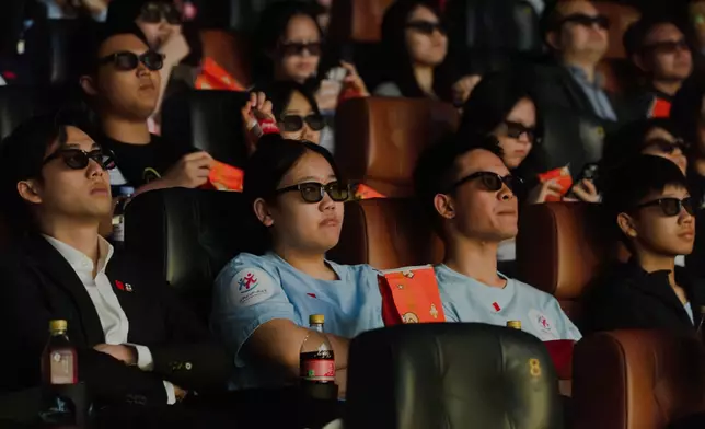 The alumni, mentors and mentees of the Strive and Rise Programme, as well as strategic partners from the Partners’ Board of the programme, watch the Hong Kong premiere of Horse Power in 3D alongside other guests. Photo source: HKJC