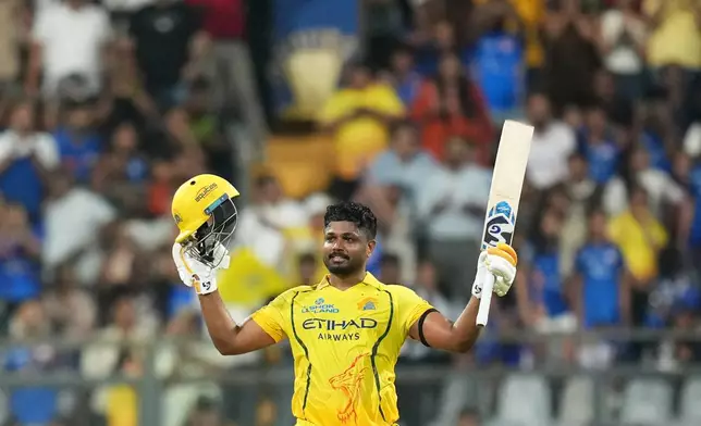 Chennai Super Kings' Sanju Samson celebrates his century during the Indian Premier League cricket match between Mumbai Indians and Chennai Super Kings in Mumbai, India, Thursday, April 23, 2026.(AP Photo/ Rafiq Maqbool)