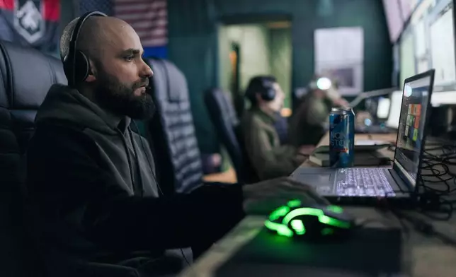 Soldiers from Ukraine's Khartia brigade operate drones from the Kharkiv region, Ukraine, Feb. 30, 2026. (AP Photo/Nikoletta Stoyanova)