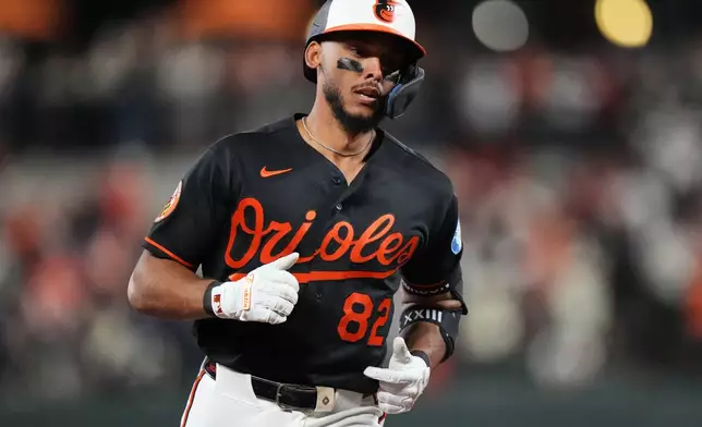 Baltimore Orioles' Jeremiah Jackson (82) rounds the bases after hitting a home run during the seventh inning of a baseball game against the San Francisco Giants, Saturday, April 11, 2026, in Baltimore. (AP Photo/Stephanie Scarbrough)