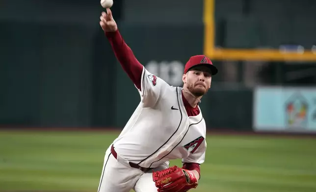 Arizona Diamondbacks pitcher Ryne Nelson throws against the Atlanta Braves in the first inning of a baseball game, Thursday, April 2, 2026, in Phoenix. (AP Photo/Rick Scuteri)