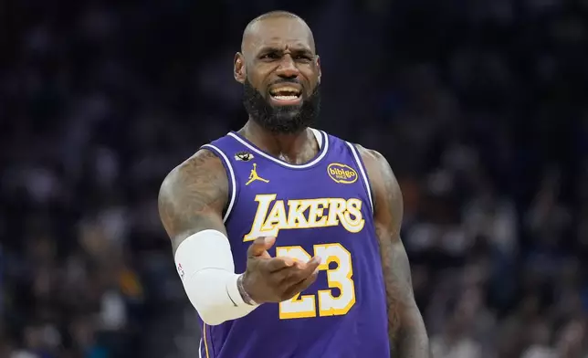Los Angeles Lakers forward LeBron James (23) reacts during the first half of an NBA basketball game against the Golden State Warriors in San Francisco, Thursday, April 9, 2026. (AP Photo/Jeff Chiu)
