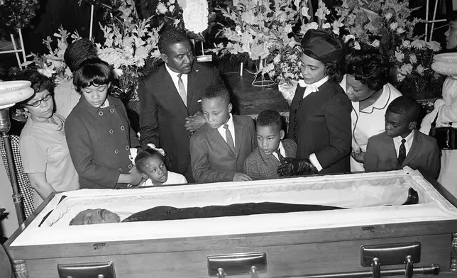 FILE - Coretta Scott King, third right, is accompanied by her children, Yolanda, Bernice, Martin III, and Dexter at Sisters Chapel on the campus of Spellman College in Atlanta, April 8, 1968. (AP Photo/Jack Thornell, File)