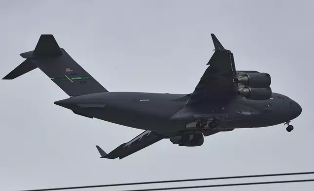 A U.S. Air Force Boeing C-17 Globemaster III transport aircraft prepares to land at Nur Khan airbase, ahead of second round of negotiations between the U.S. and Iran, in Rawalpindi, Pakistan, Monday, April 20, 2026. (AP Photo/Ehsan Shahzad)