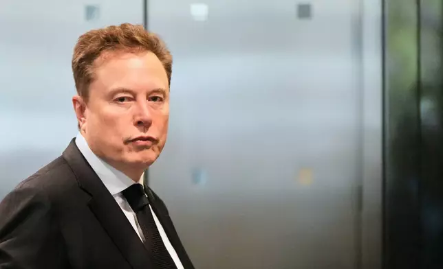 Elon Musk arrives at the U.S. District Court in Oakland, Calif., Tuesday, April 28, 2026. (AP Photo/Godofredo A. Vásquez)