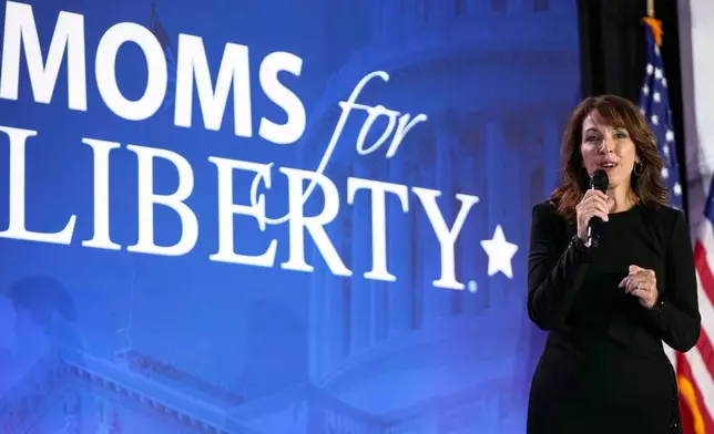 FILE - Moms for Liberty co-founder Tina Descovich speaks before Republican presidential nominee former President Donald Trump at the Moms for Liberty annual convention in Washington, Aug. 30, 2024. (AP Photo/Mark Schiefelbein, File)