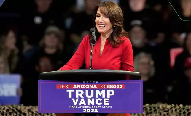 FILE - Tina Descovich, co-founder of Moms for Liberty, speaks before Republican presidential nominee former President Donald Trump at a campaign rally at the Findlay Toyota Arena, Oct. 13, 2024, in Prescott Valley, Ariz. (AP Photo/Ross D. Franklin, File)