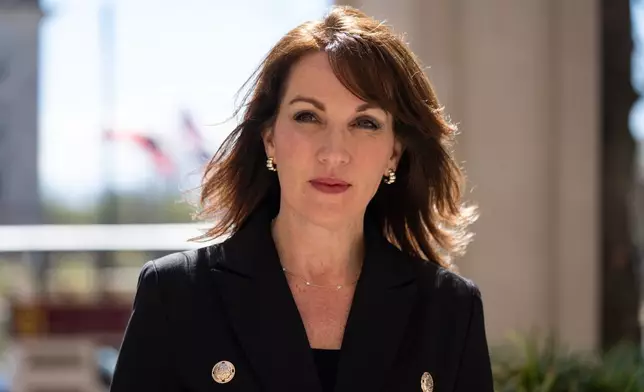 Tina Descovich poses for a portrait Monday, March 23, 2026, in Washington. (AP Photo/Allison Robbert)