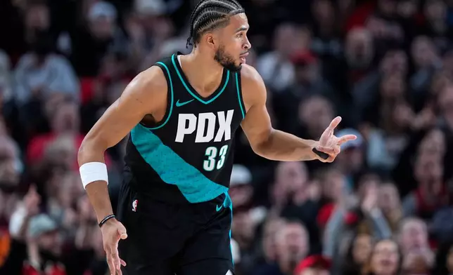 Portland Trail Blazers forward Toumani Camara reacts after making a 3-pointer during the first half of an NBA basketball game against the New Orleans Pelicans, Thursday, April 2, 2026, in Portland, Ore. (AP Photo/Jenny Kane)