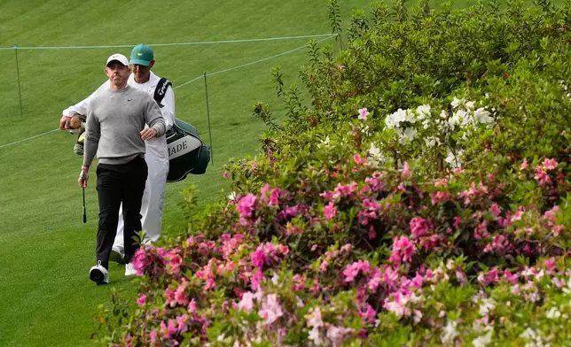 Rory McIlroy, of Northern Ireland, walks to green on the sixth hole during a practice round ahead of the Masters golf tournament at the Augusta National Golf Club, Tuesday, April 7, 2026, in Augusta, Ga. (AP Photo/David J. Phillip)