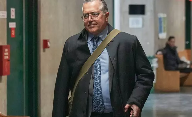 Harvey Weinstein's attorney Marc Agnifilo arrives in criminal court in New York, Tuesday, April 21, 2026. (AP Photo/Richard Drew)