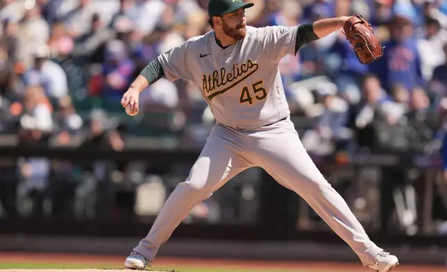 Oakland Athletics pitcher Aaron Civale throws during the first inning of a baseball game against the New York Mets, Sunday, April 12, 2026, in New York. (AP Photo/Seth Wenig)