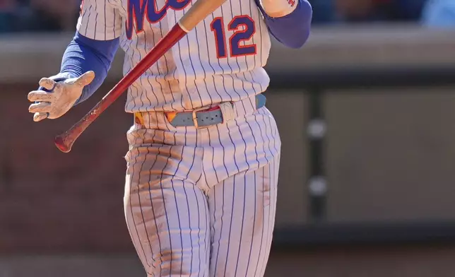 New York Mets' Francisco Lindor reacts after a strike during the eighth inning of a baseball game against the Oakland Athletics, Sunday, April 12, 2026, in New York. (AP Photo/Seth Wenig)