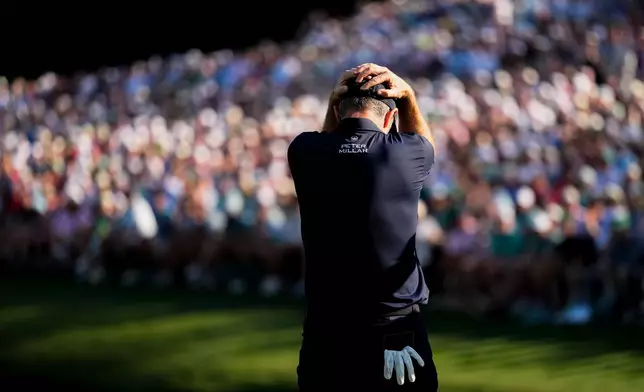 Justin Rose, of England, reacts after missing a putt on the 16th hole during the final round of the Masters golf tournament at the Augusta National Golf Club, Sunday, April 12, 2026, in Augusta, Ga. (AP Photo/Gerald Herbert)