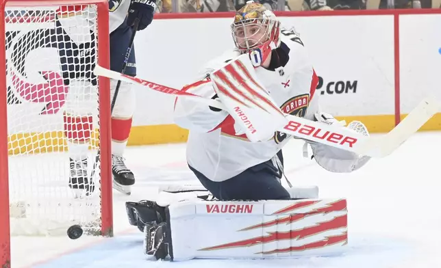Florida Panthers goalie Daniil Tarasov (40) allows a goal from Pittsburgh Penguins defenseman Ryan Shea during the second period of an NHL game, Saturday, April 4, 2026, in Pittsburgh. (AP Photo/Philip G. Pavely)