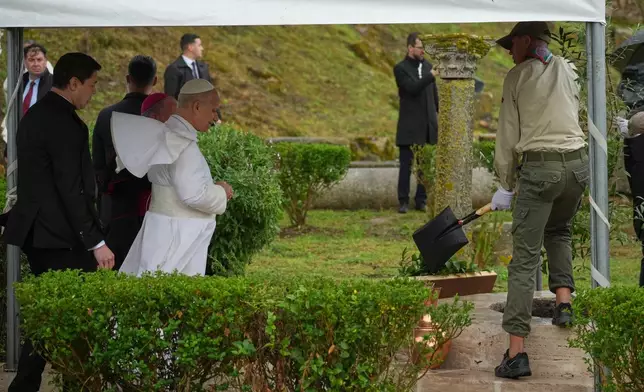 Pope Leo XIV visits the archaeological site of Hippo, in Annaba, Algeria, Tuesday, April 14, 2026, on the second day of an 11-day apostolic journey to Africa. (AP Photo/Andrew Medichini)