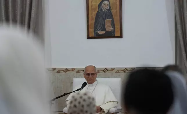 Pope Leo XIV visits the nursing home of the Little Sisters of the Poor in Annaba, Algeria, Tuesday, April 14, 2026, on the second day of an 11-day apostolic journey to Africa. (AP Photo/Andrew Medichini, Pool)