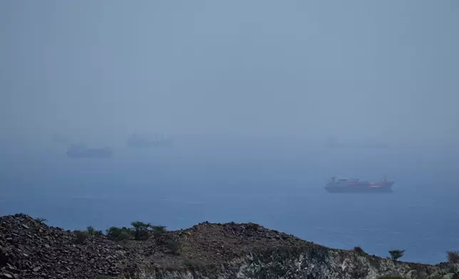 Tankers and bulk carriers anchored in the Strait of Hormuz, Saturday, April 18, 2026. (AP Photo)