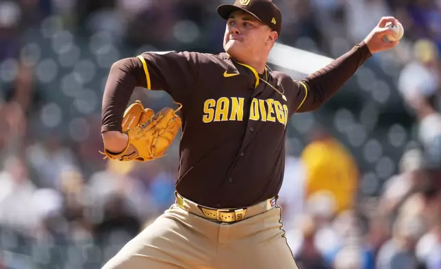 San Diego Padres relief pitcher Adrian Morejon works against the Colorado Rockies in the sixth inning of a baseball game Thursday, April 23, 2026, in Denver. (AP Photo/David Zalubowski)