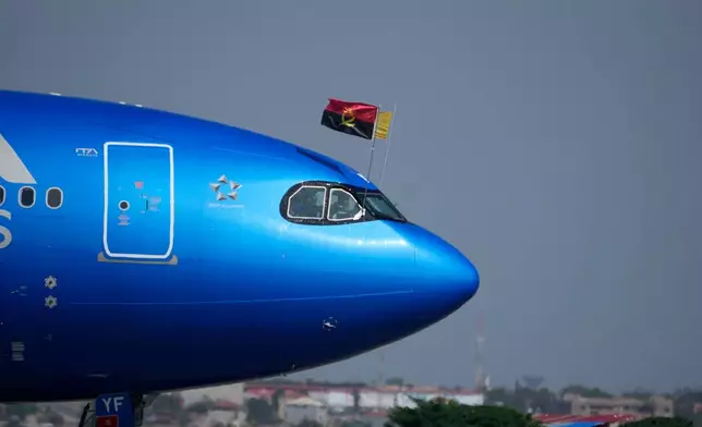 The plane carrying Pope Leo XIV arrives in Luanda, Angola, Saturday, April 18, 2026 on the sixth day of his 11-day pastoral visit to Africa. (AP Photo/Themba Hadebe)