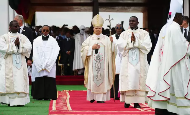 Pope Leo XIV arrives in procession to celebrate Mass at Yaounde Ville Airport, Cameroon, Saturday, April 18, 2026 on the sixth day of his 11-day pastoral visit to Africa. (AP Photo/Andrew Medichini)