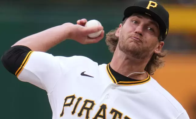 Pittsburgh Pirates pitcher Braxton Ashcraft delivers during the first inning of a baseball game against the Baltimore Orioles in Pittsburgh, Sunday, April 5, 2026. (AP Photo/Gene J. Puskar)