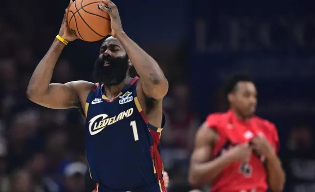Cleveland Cavaliers guard James Harden reacts after being called for a foul during the first half in Game 1 of a first-round NBA playoffs basketball series against the Toronto Raptors, Saturday, April 18, 2026, In Cleveland. (AP Photo/David Dermer)