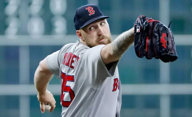 Boston Red Sox starting pitcher Garrett Crochet throws during the first inning of a baseball game against the Houston Astros, Wednesday, April 1, 2026, in Houston. (AP Photo/Michael Wyke)