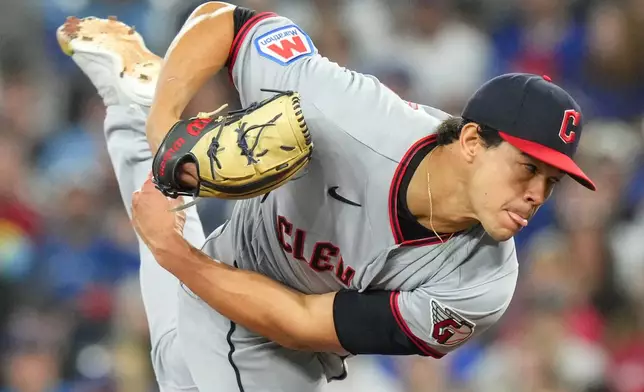 Cleveland Guardians pitcher Joey Cantillo (54) works against the Toronto Blue Jays during the first inning of a baseball game in Toronto, Saturday, April 25, 2026. (Chris Young/The Canadian Press via AP)