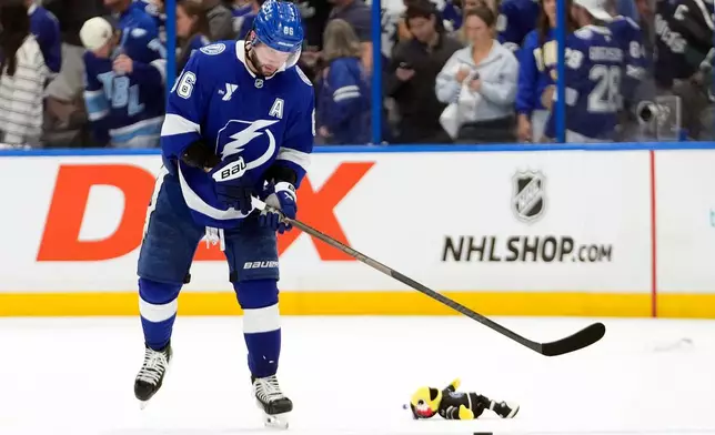Tampa Bay Lightning right wing Nikita Kucherov (86) reacts after the team lost to the Montréal Canadiens in Game 5 of an NHL hockey Stanley Cup first-round playoff series, Wednesday, April 29, 2026, in Tampa, Fla. (AP Photo/Chris O'Meara)