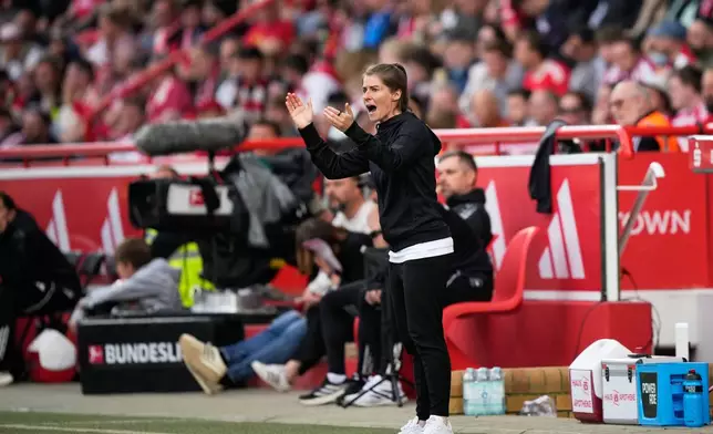 New head coach of German Bundesliga soccer club 1. FC Union Berlin Marie-Louise Eta reacts during the German Bundesliga soccer match between FC Union Berlin and Wolfsburg in Berlin, Germany, Saturday, April 18, 2026. (AP Photo/Ebrahim Noroozi)