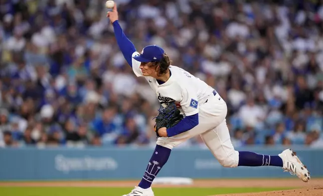 Los Angeles Dodgers pitcher Tyler Glasnow throws to the plate during the first inning of a baseball game against the Texas Rangers, Friday, April 10, 2026, in Los Angeles. (AP Photo/Mark J. Terrill)