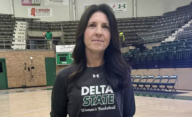 Delta State women's basketball coach Tracy Stewart-Lange poses for a photo, Feb. 17, 2026, in Cleveland, Miss. (AP Photo/Alanis Thames)