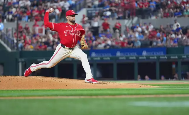 Texas Rangers starting pitcher Nathan Eovaldi throws to the Athletics during the first inning of a baseball game Friday, April 24, 2026, in Arlington, Texas. (AP Photo/Julio Cortez)
