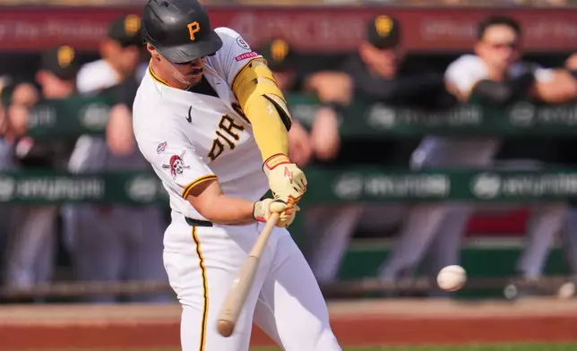 Pittsburgh Pirates' Konnor Griffin hits an RBI double, his first Major League career hit and run, during the second inning of a baseball game against the Baltimore Orioles in Pittsburgh, Friday, April 3, 2026. (AP Photo/Gene J. Puskar)