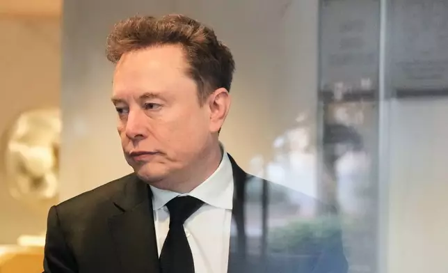 Elon Musk arrives at the U.S. District Court in Oakland, Calif., Tuesday, April 28, 2026. (AP Photo/Godofredo A. Vásquez)